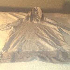 It’s a grey sweat shirt or shirt